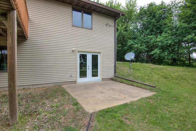 8103 W Folsom St, Eau Claire, WI 54703 - back of house with a lawn, a patio, and french doors
