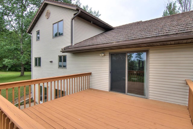8103 W Folsom St, Eau Claire, WI 54703 - wooden deck featuring a lawn