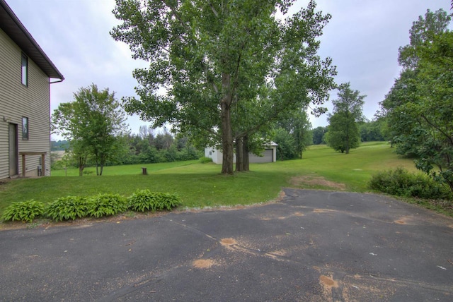 8103 W Folsom St, Eau Claire, WI 54703 - view of grassy yard featuring an outdoor structure