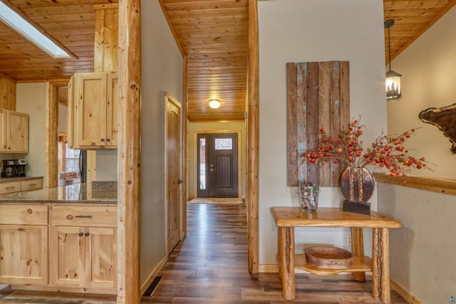 7760 N Thunder Point Rd, Hayward, WI 54843 - corridor featuring lofted ceiling, wood ceiling, dark wood-style floors, and a skylight