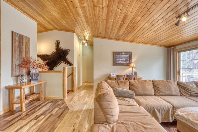 7760 N Thunder Point Rd, Hayward, WI 54843 - living area featuring wooden ceiling, hardwood / wood-style flooring, lofted ceiling, and crown molding