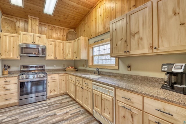 7760 N Thunder Point Rd, Hayward, WI 54843 - kitchen with appliances with stainless steel finishes, light brown cabinetry, vaulted ceiling, light wood-type flooring, and wooden ceiling