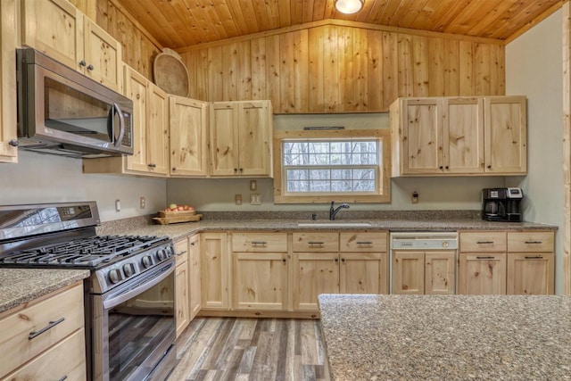 7760 N Thunder Point Rd, Hayward, WI 54843 - kitchen with appliances with stainless steel finishes, light brown cabinets, wood ceiling, vaulted ceiling, and light wood-style flooring