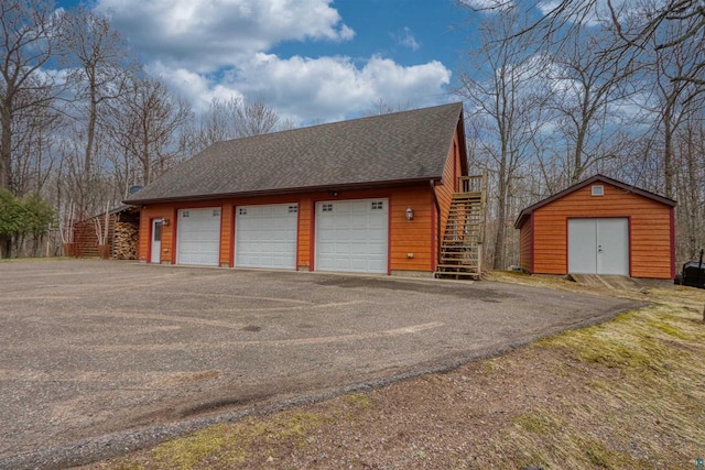 7760 N Thunder Point Rd, Hayward, WI 54843 - detached garage with a shed
