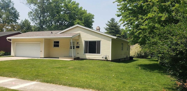 1702 Rae Ln, Madison, WI 53711 - view of front of house with an attached garage, a front lawn, and driveway