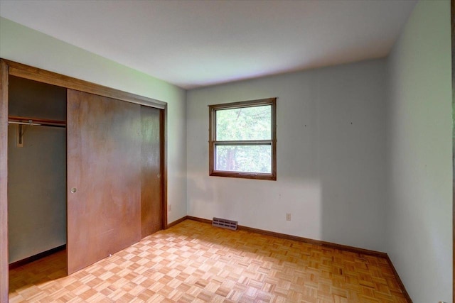 1702 Rae Ln, Madison, WI 53711 - unfurnished bedroom with a closet and baseboards