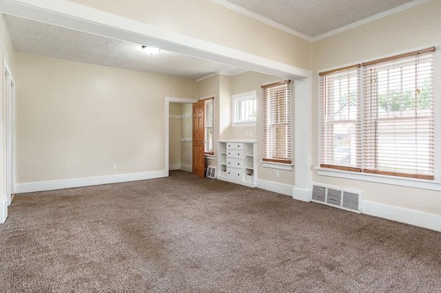 619 Middle St, Beloit, WI 53511 - unfurnished living room featuring carpet, crown molding, and a textured ceiling