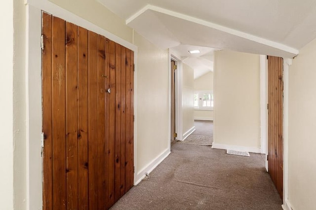 619 Middle St, Beloit, WI 53511 - hallway with dark colored carpet and lofted ceiling