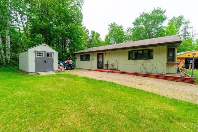 N8981 W Island Rd, Phillips, WI 54555 - back of house with a shed, a lawn, and a wooden deck