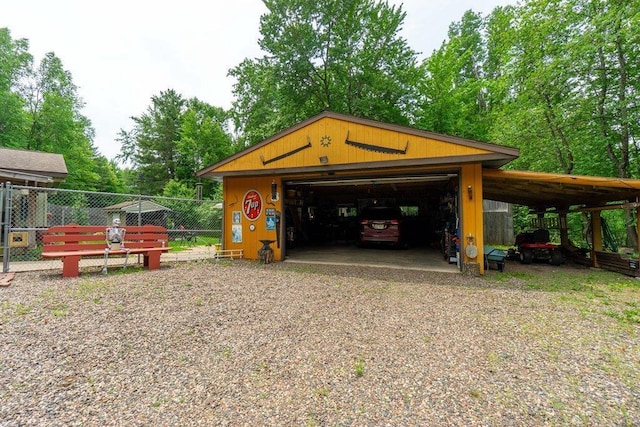 N8981 W Island Rd, Phillips, WI 54555 - view of vehicle parking featuring a garage
