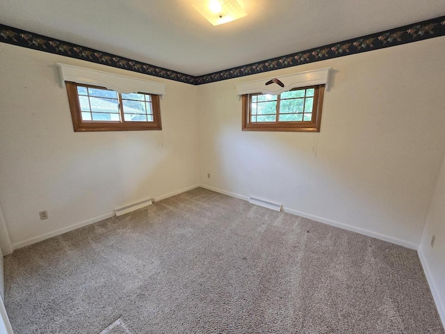 1440 4th St, Port Edwards, WI 54469 - carpeted empty room featuring baseboards