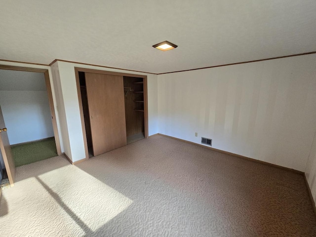 1440 4th St, Port Edwards, WI 54469 - unfurnished bedroom featuring carpet and a closet