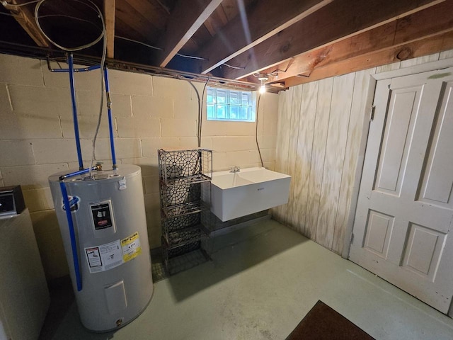 1440 4th St, Port Edwards, WI 54469 - below grade area featuring electric water heater and a sink