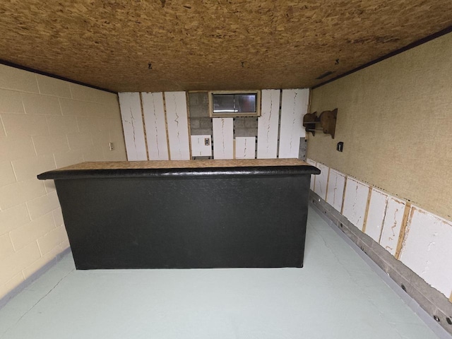 1440 4th St, Port Edwards, WI 54469 - indoor dry bar featuring concrete block wall and finished concrete flooring