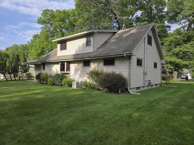1440 4th St, Port Edwards, WI 54469 - view of home's exterior with a lawn and roof with shingles