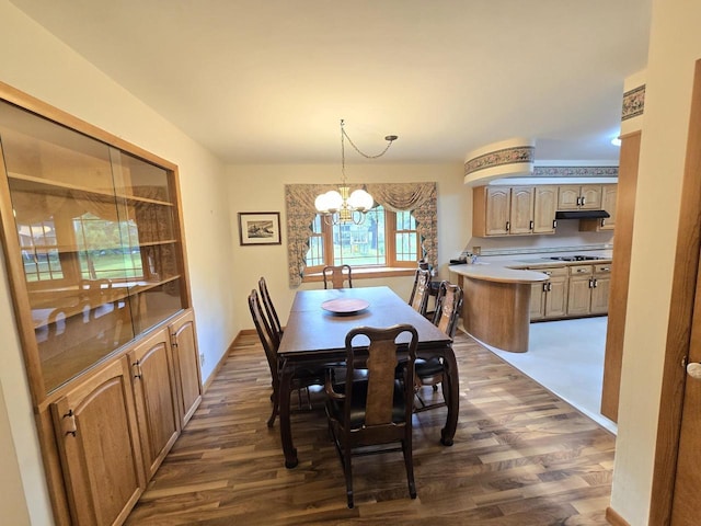 1440 4th St, Port Edwards, WI 54469 - dining area featuring dark wood-type flooring and a chandelier