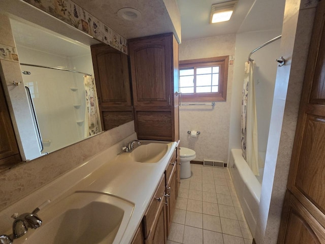 1440 4th St, Port Edwards, WI 54469 - full bathroom with tile patterned floors, double vanity, and shower / bath combo
