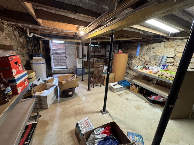 7376 Neils Rd, Sturgeon Bay, WI 54235 - unfinished basement with water heater and a water softener