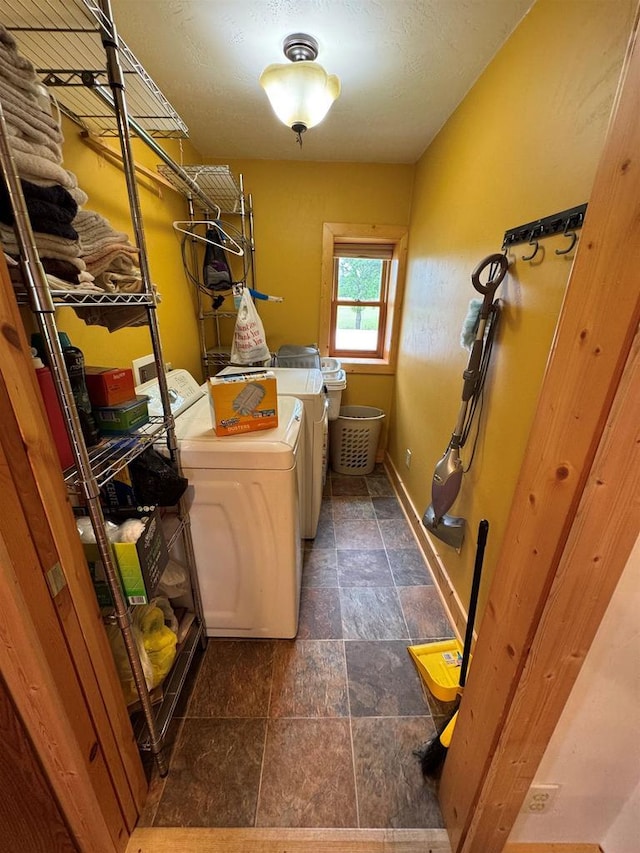 7376 Neils Rd, Sturgeon Bay, WI 54235 - washroom featuring washing machine and dryer and stone finish floors