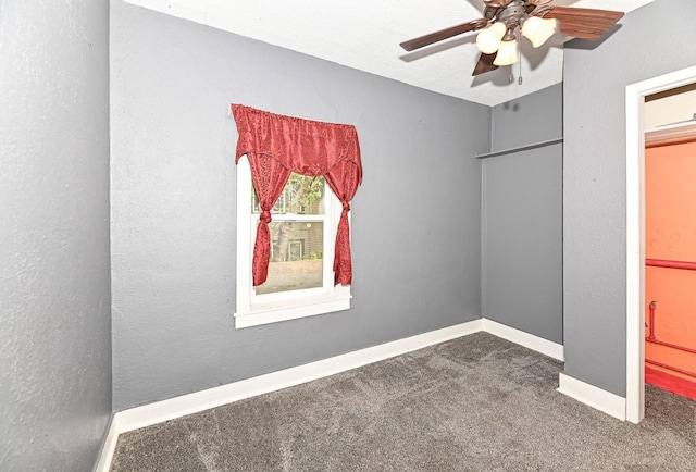1721 Spring Pl, Racine, WI 53404 - unfurnished bedroom featuring carpet and ceiling fan