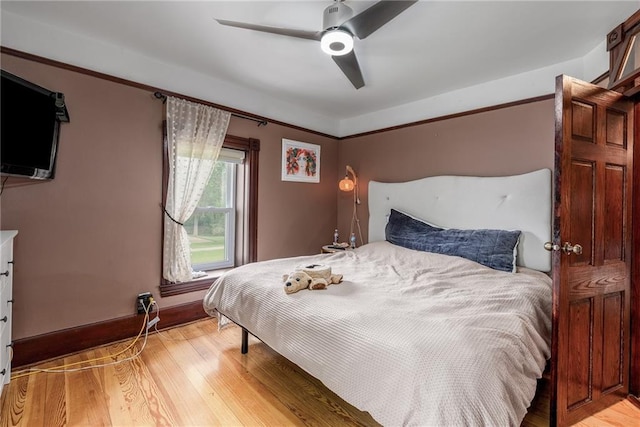 508 Evergreen St, Colfax, WI 54730 - bedroom with light wood-type flooring and ceiling fan