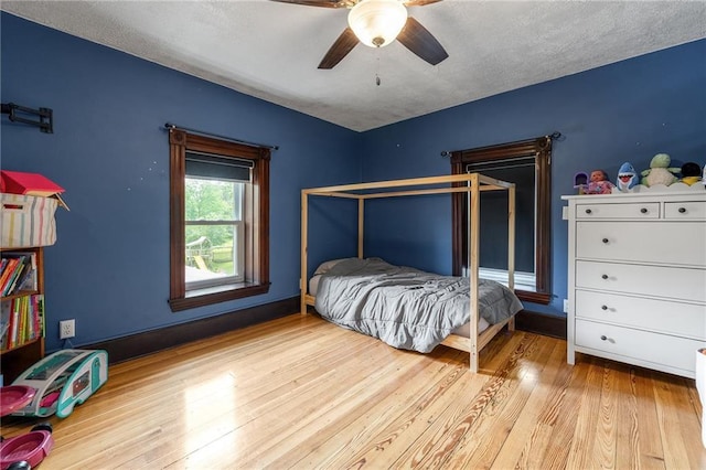 508 Evergreen St, Colfax, WI 54730 - bedroom with wood finished floors and a ceiling fan