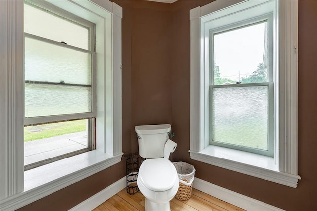 508 Evergreen St, Colfax, WI 54730 - bathroom featuring toilet and wood finished floors