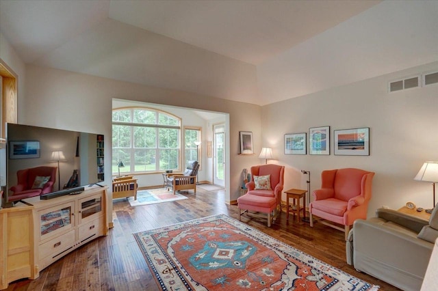 8201 Highview Dr, Madison, WI 53719 - living room with hardwood / wood-style flooring and vaulted ceiling