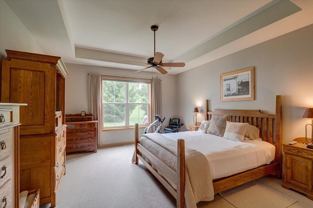 8201 Highview Dr, Madison, WI 53719 - bedroom featuring a raised ceiling, light carpet, and ceiling fan