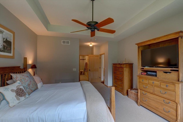 8201 Highview Dr, Madison, WI 53719 - bedroom featuring a tray ceiling, carpet, and a ceiling fan
