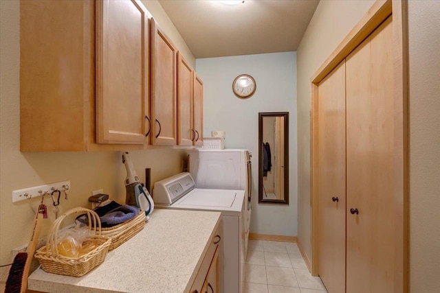 8201 Highview Dr, Madison, WI 53719 - laundry room featuring cabinet space, independent washer and dryer, and light tile patterned floors