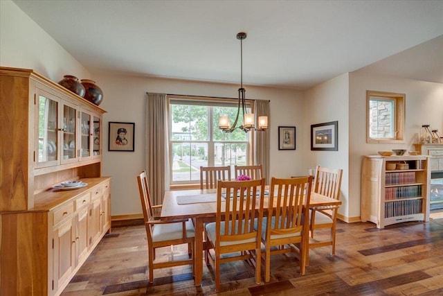 8201 Highview Dr, Madison, WI 53719 - dining room featuring light wood-style floors and a chandelier