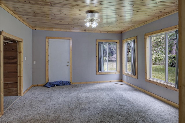 66 Torrey St, Clintonville, WI 54929 - carpeted empty room featuring wood ceiling and a ceiling fan