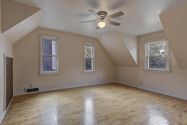 66 Torrey St, Clintonville, WI 54929 - bonus room featuring healthy amount of natural light, wood-type flooring, vaulted ceiling, and ceiling fan