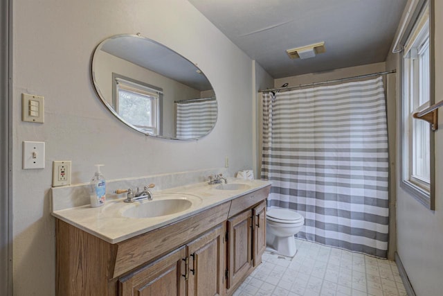 66 Torrey St, Clintonville, WI 54929 - full bathroom featuring double vanity, tile patterned floors, and a shower with shower curtain
