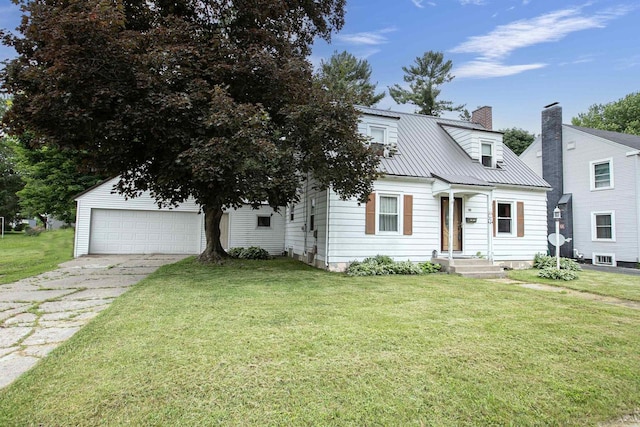 66 Torrey St, Clintonville, WI 54929 - view of front facade with a front yard, a chimney, a metal roof, and driveway
