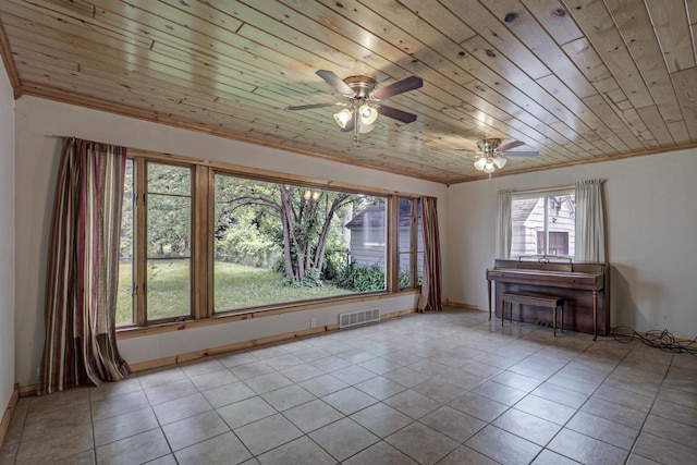 66 Torrey St, Clintonville, WI 54929 - unfurnished room with ceiling fan, ornamental molding, tile patterned flooring, and wood ceiling