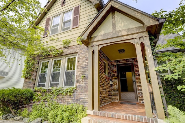 518 Maple Ave, Madison, WI 53704 - doorway to property featuring brick siding