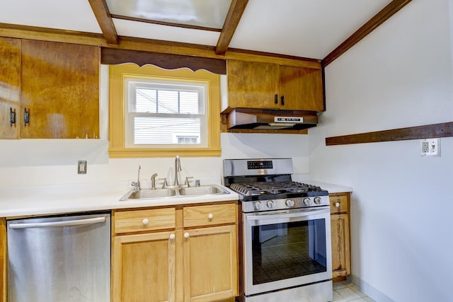 518 Maple Ave, Madison, WI 53704 - kitchen with stainless steel appliances, under cabinet range hood, light countertops, and beam ceiling
