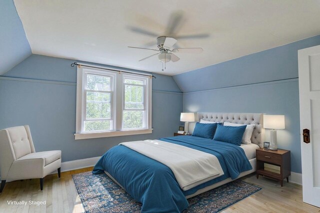 518 Maple Ave, Madison, WI 53704 - bedroom featuring vaulted ceiling, light wood-style flooring, and a ceiling fan