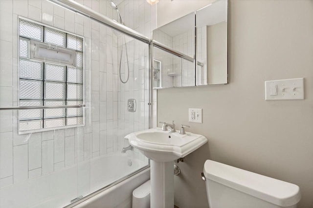 2140 N 64th St, Wauwatosa, WI 53213 - bathroom featuring combined bath / shower with glass door and plenty of natural light