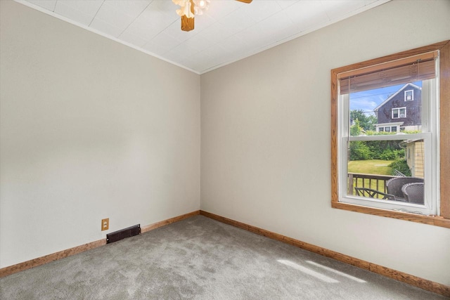 2140 N 64th St, Wauwatosa, WI 53213 - unfurnished room with carpet flooring, crown molding, and a ceiling fan
