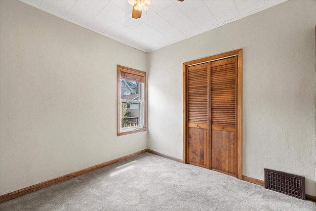 2140 N 64th St, Wauwatosa, WI 53213 - unfurnished bedroom featuring carpet, a closet, ornamental molding, and ceiling fan