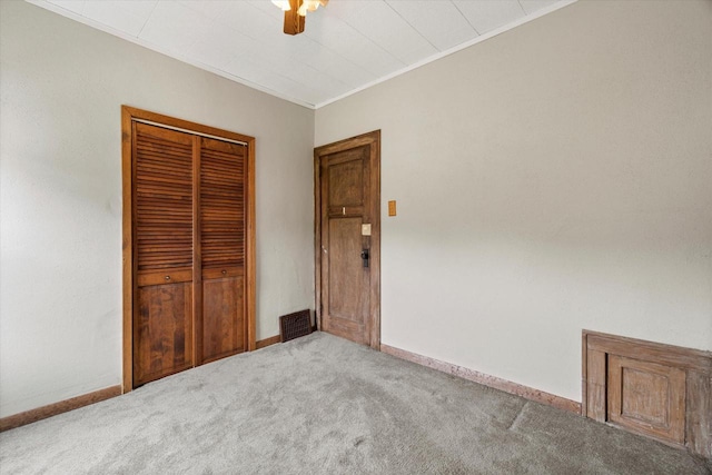 2140 N 64th St, Wauwatosa, WI 53213 - unfurnished bedroom with carpet, a closet, and a ceiling fan