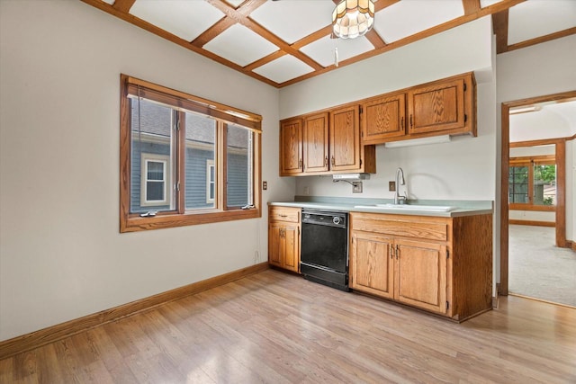 2140 N 64th St, Wauwatosa, WI 53213 - kitchen with dishwasher, light countertops, light wood-type flooring, and brown cabinets