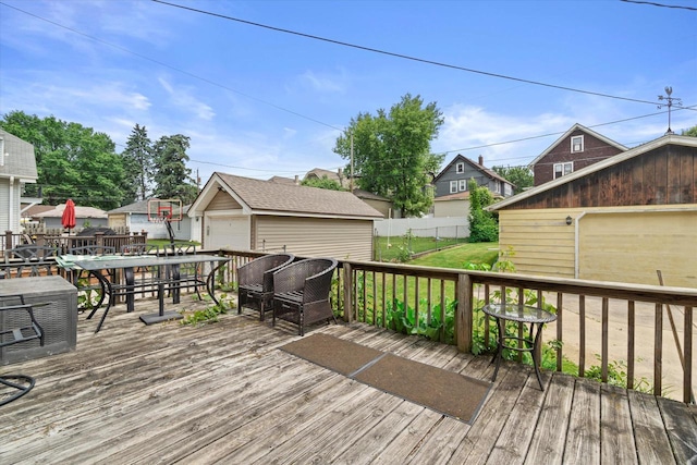 2140 N 64th St, Wauwatosa, WI 53213 - wooden terrace with an outdoor structure, outdoor dining area, and a detached garage
