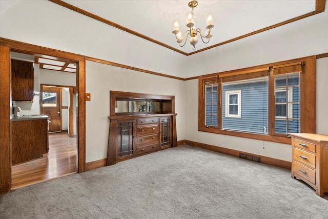 2140 N 64th St, Wauwatosa, WI 53213 - empty room featuring carpet flooring and a chandelier