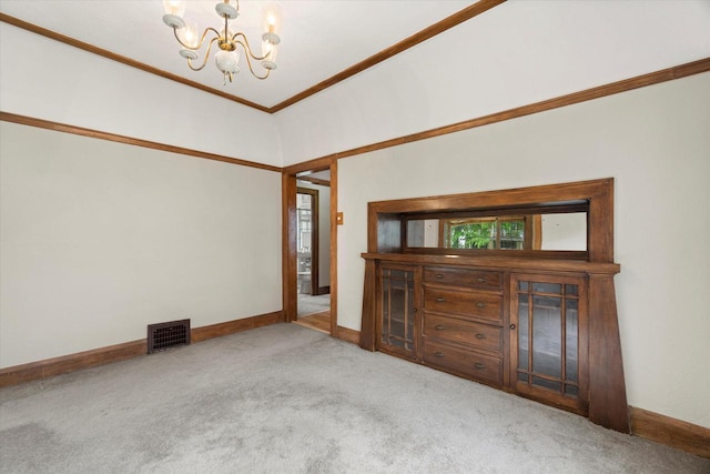 2140 N 64th St, Wauwatosa, WI 53213 - carpeted spare room featuring a chandelier and crown molding