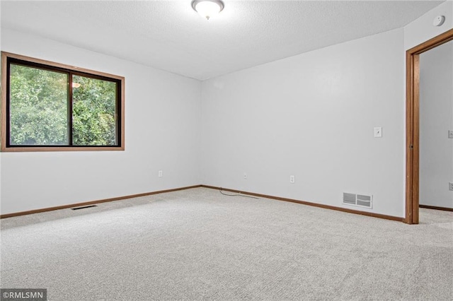 1754 Helena Rd, Oakdale, MN 55128 - carpeted empty room with a smoke detector and a textured ceiling