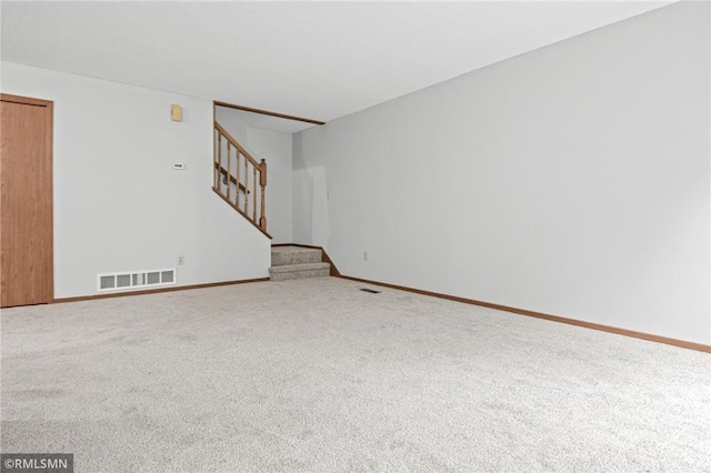 1754 Helena Rd, Oakdale, MN 55128 - carpeted empty room with stairway and baseboards